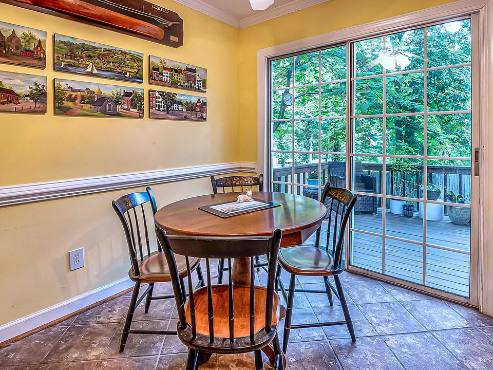 Dining area beside sliding glass patio doors