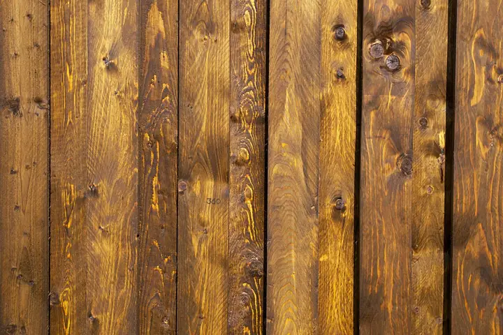 A detailed close-up of rustic wooden panels showcasing natural grain and texture